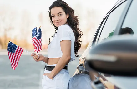 Customer next to a rental car